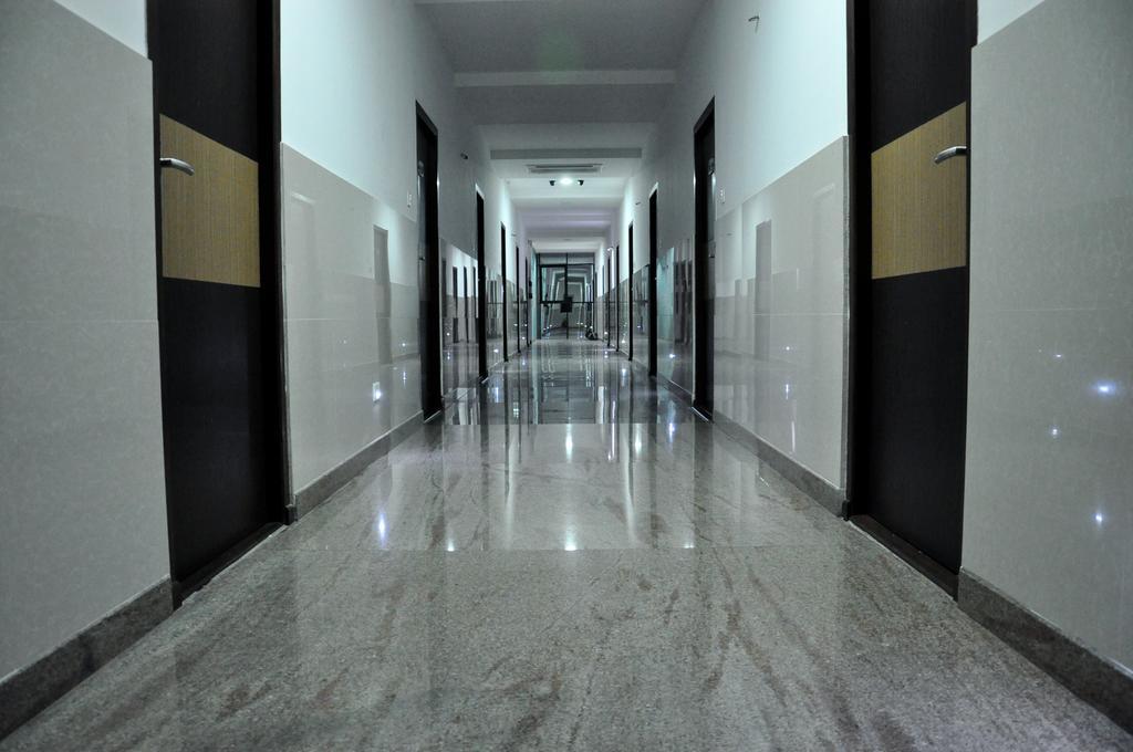 Hotel The Home Tiruppur Phòng bức ảnh